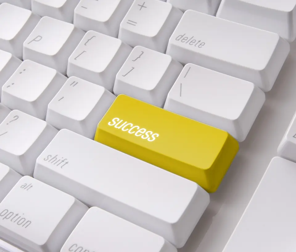 Touche jaune success sur un clavier